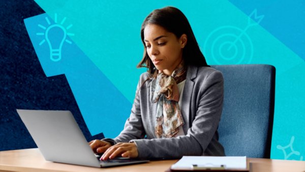 Focused businesswoman working on laptop computer