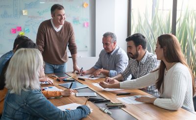 People in a conference room meeting