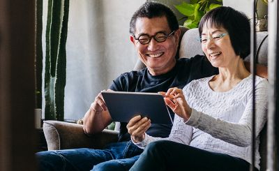 Couple looking at tablet